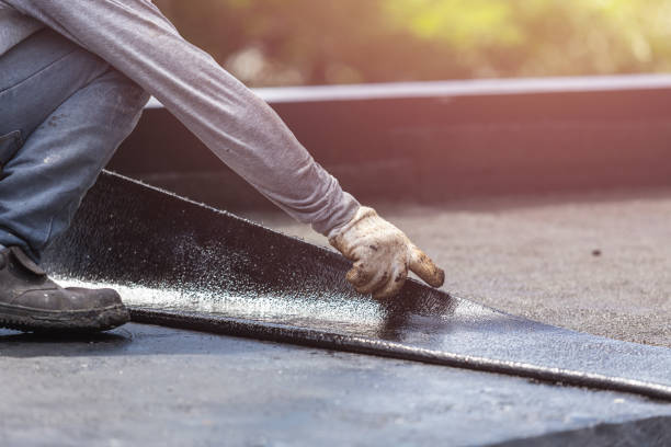 Professional Basement Waterproofing technician working in Hickman, KY